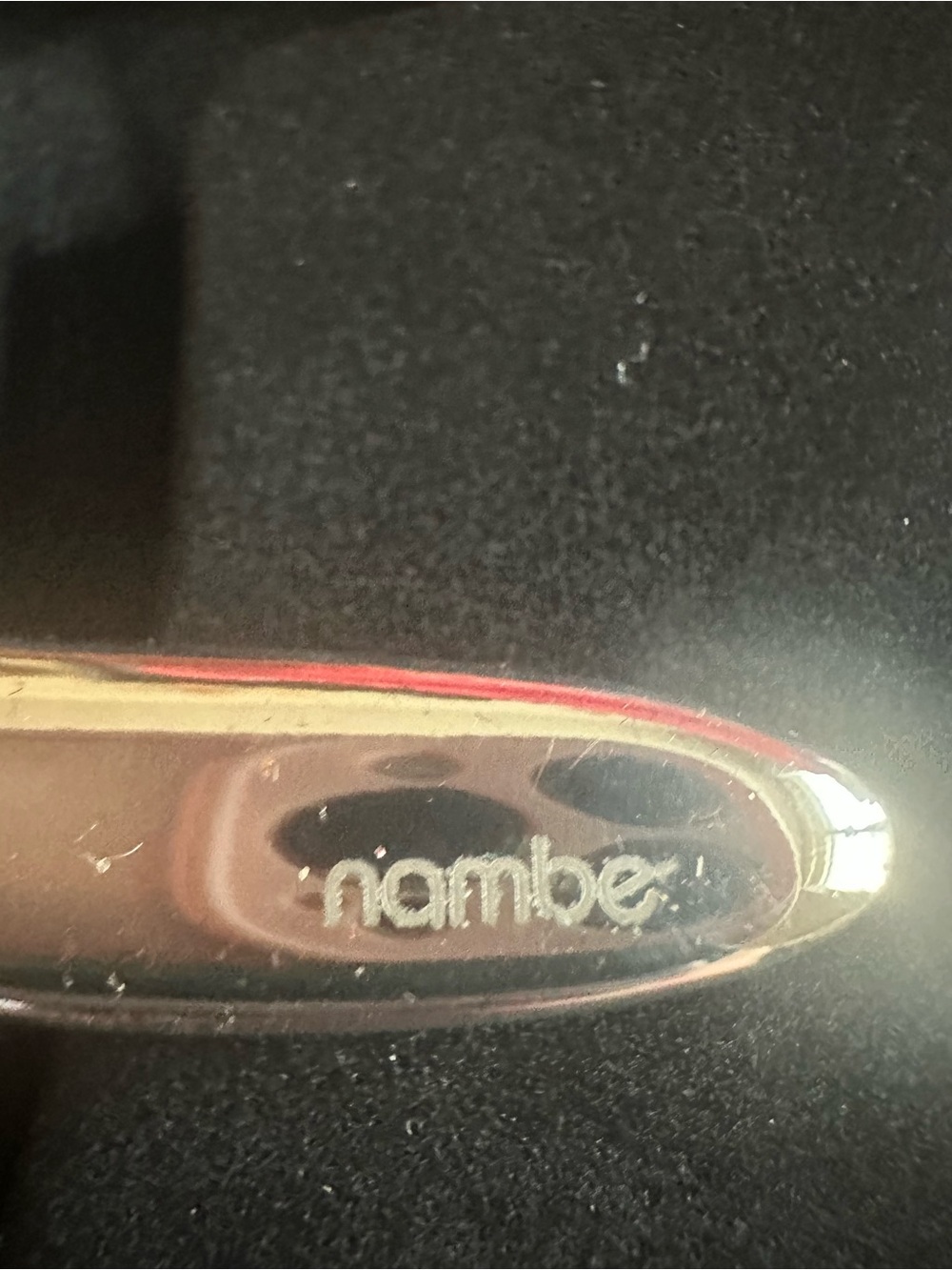 Nambe Silver Cross Ornament with Red Ribbon - Picture 2 of 2